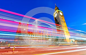 Light trails of Red Bus in front of Big Ben and Westminster Palace