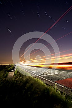 Light trails on a rural road, cat and fiddle