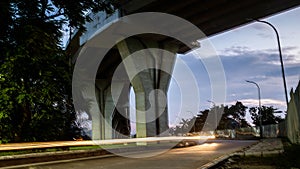 Light trails of vehicles under the Mahakam bridge flyover, Samarinda,