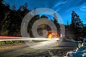 Light Trails by Wawona Tunnel at Night - Yosemite National Park, California photo