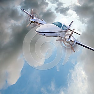 Light twin-engined piston aircraft in flight