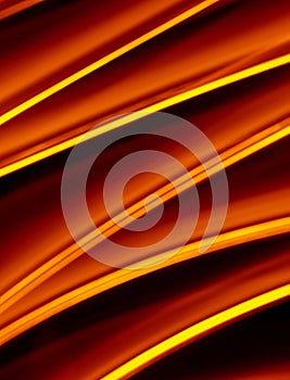 Light wave trail path, vibrant neon gold color in abstract swirls on a black background