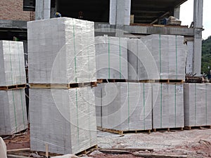 Light weight brick or other name called Autoclaved Aerated Concrete brick pallet at the construction site.