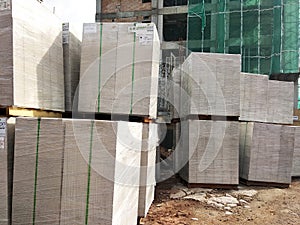 Light weight brick or other name called Autoclaved Aerated Concrete brick pallet at the construction site.