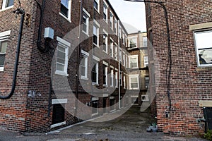 Light well of an old brick apartment building to allow light into the interior spaces, urban landscape