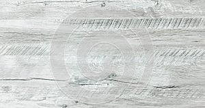 Light white washed soft wood texture surface as background. Grunge whitewashed varnished wooden planks table pattern top view.