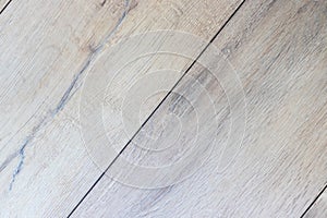 Light wooden background texture. Laminate flooring, wood effect floor tiles