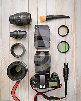 digital camera, several different lenses, filters, cables