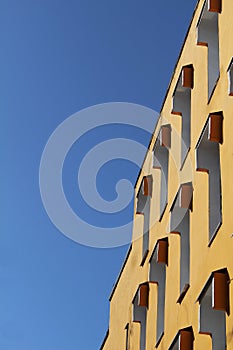 architecture geometry yellow building blue sky
