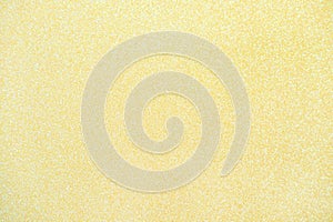 Light yellow glitter texture abstract background