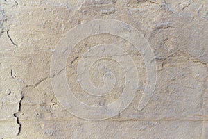 Light yellow stone wall texture background