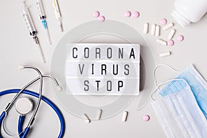 Lightboard with words Coronavirus stop. Atypical pneumonia in Wuhan, China. Severe acute respiratory syndrome. Coronavirus