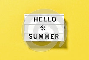 Lightbox message Hello Summer yellow background