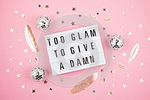 Lightbox with phrase Too glam to give a damn