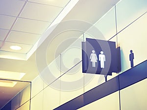 Lightbox of public restroom sign