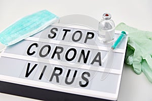 Lightbox with stop coronavirus caution words