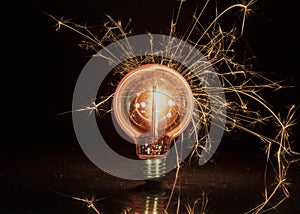 Lightbulb with sparks emitting from it