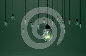 Lightbulbs on green background, photo