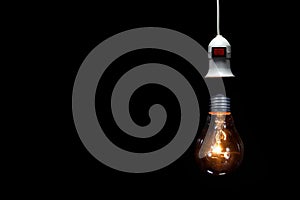 Lightbuld and wire on black backgound,idea tinking concept