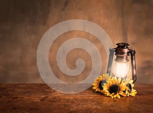 Lighted Antique lantern background with sunflowers