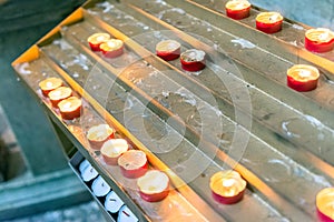 Lighted candles in catholic church