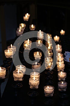 Lighted candles in a church