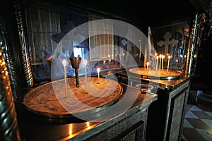 Lighted candles in the monastery of the Virgin Mary in Paleokastritsa