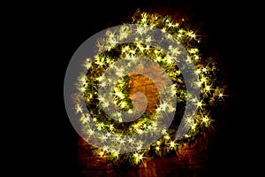 Lighted Christmas Wreath at night