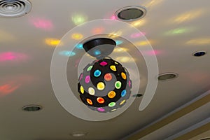 Lighted disco ball on a celling 