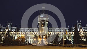 Lighted Palace of culture in the night , romania, symbol of moldovia