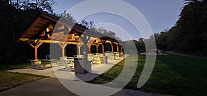 Lighted park shelter at dusk in Stewart lake county park Mount Horeb wisconsin photo