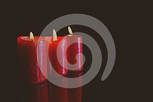 Lighted red candles