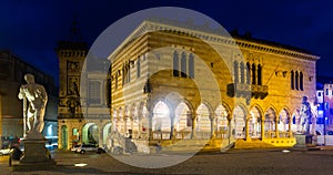 Lighted town hall of Udine on Piazza liberta, Italy