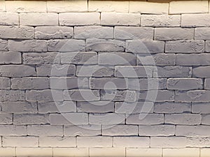 Lighted white brick wall background