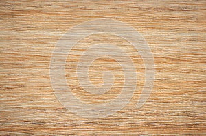 Lightened beech, a flat polished natural wood surface close-up on a cut