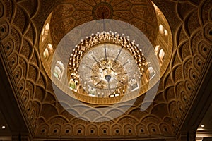 Lightened up crystal chandelier in the Sultan Qaboos Mosque in Salalah, Oman