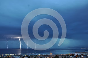 Lightening and four thunderbolt strikes Adriatic Sea.Thunderstorm near Rijeka city