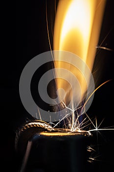 A Lighter Being Lit in the Dark