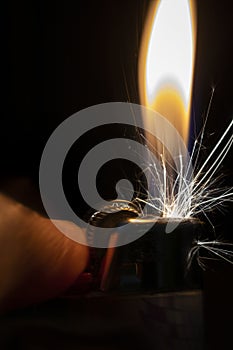 A Lighter Being Lit in the Dark