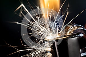 Lighter Igniting Sparks