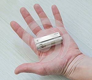 Lighter in man`s hand