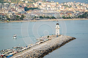 Lighthouse in Alanya marina, one of the touristic districts of Antalya photo