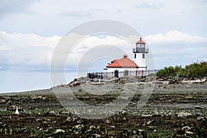 Lighthouse at Alki Point on a cloudy summer day, Seattle, Washington