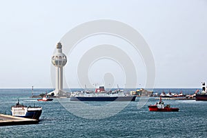Lighthouse as a symbol of the port of Jeddah, Saudi Arabia. photo