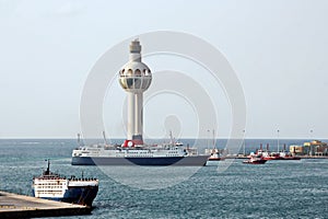 Lighthouse as a symbol of the port of Jeddah, Saudi Arabia. photo