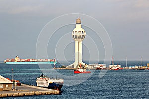 Lighthouse as a symbol of the port of Jeddah, Saudi Arabia. photo