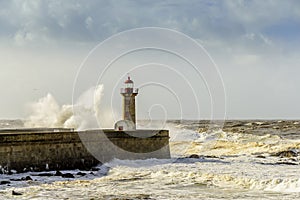 Lighthouse battered by huge waves on Portuguese Atlantic Ocean