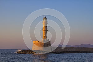 Lighthouse and bay of Chania at sunset, Crete , Greece.