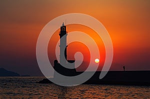 Lighthouse and bay of Chania at sunset, Crete , Greece.