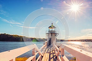 Lighthouse on the bay. Doubling Point Light is a lighthouse on the Kennebec River in Arrovich, Maine. USA. Maine. Beautiful green